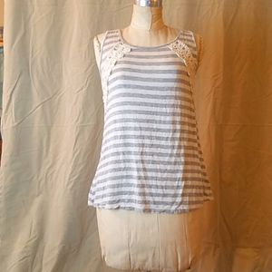 Maurices Silver and cream colored top with lace. Size XS.